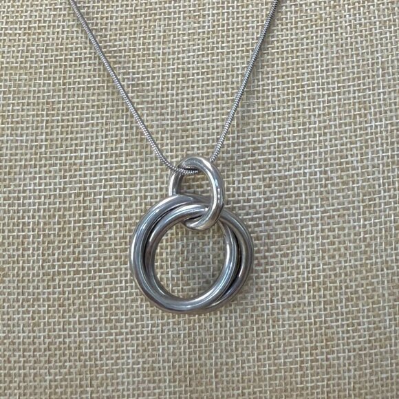Lani Silver Tone Intertwined Ring Pendant Necklace 23" With Adjustable Chain - Picture 2 of 11